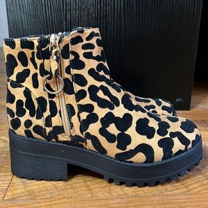 Brand new Qupid heeled animal print boots.
